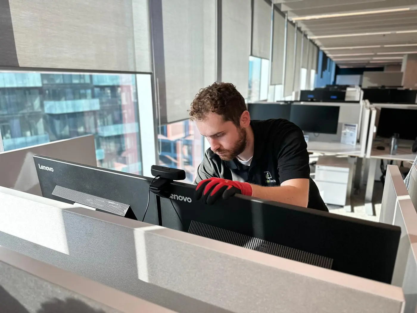 IT technician working on office computer systems